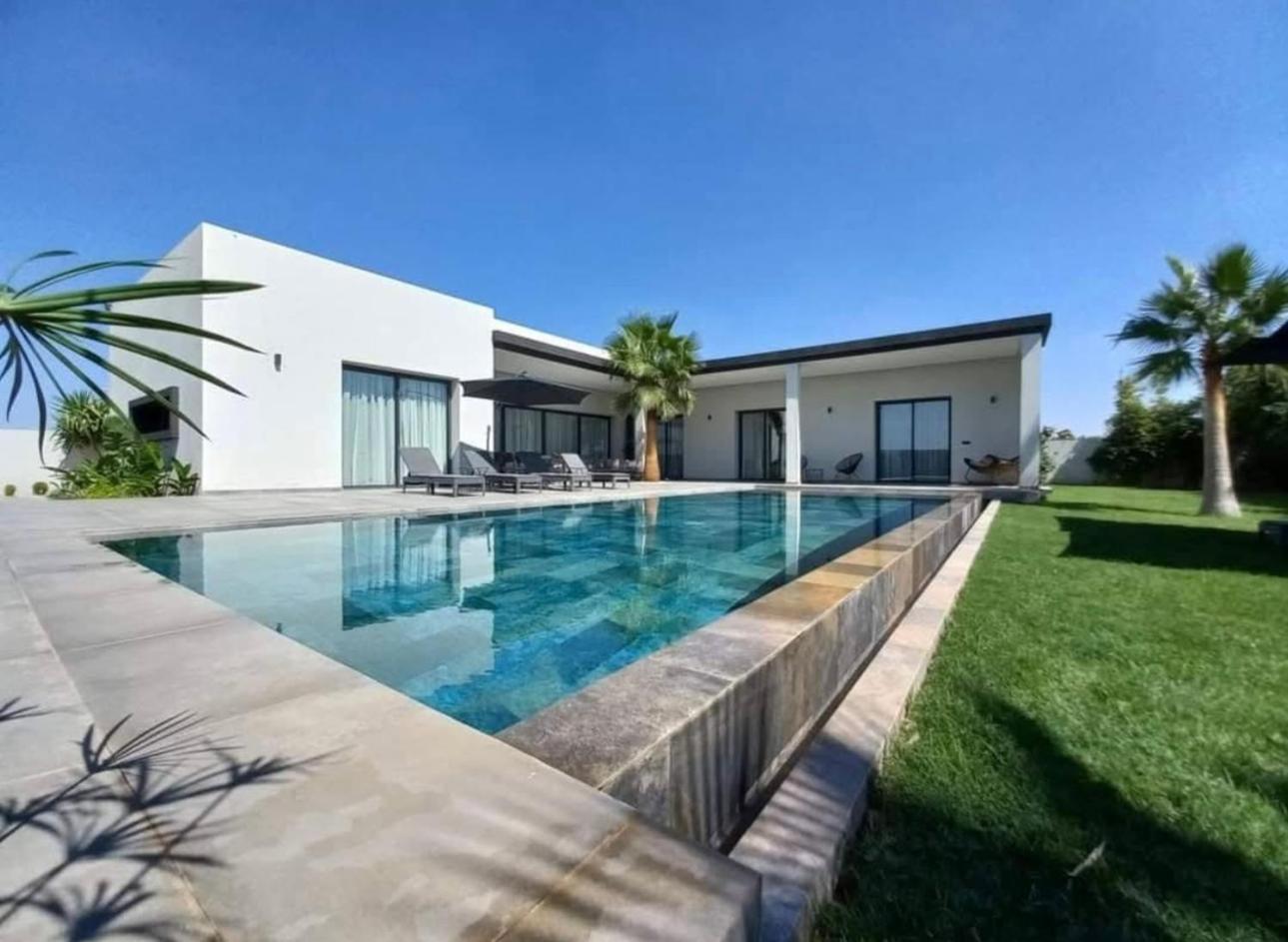 Villa Sable Vagues Une Oasis De Detente Au Bord De L Eau Tamraght Exterior foto